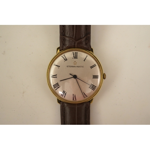 142 - A gentleman's 18ct gold Eterna-Matic manual wind dress wrist watch, on a later associated Hirsch lea... 