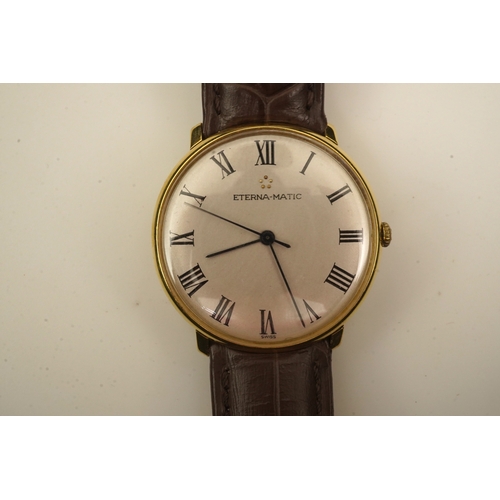 142 - A gentleman's 18ct gold Eterna-Matic manual wind dress wrist watch, on a later associated Hirsch lea... 