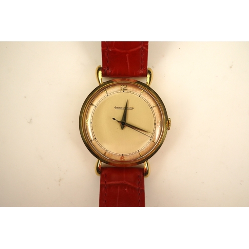 143 - A gentleman's 1950's 18ct gold Jaeger LeCoultre manual wind wrist watch, on a later associated leath... 