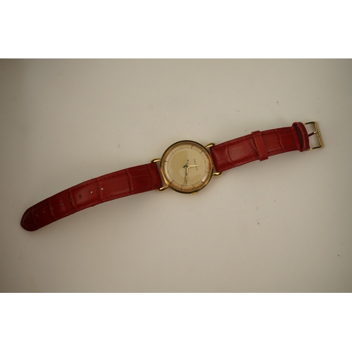 143 - A gentleman's 1950's 18ct gold Jaeger LeCoultre manual wind wrist watch, on a later associated leath... 