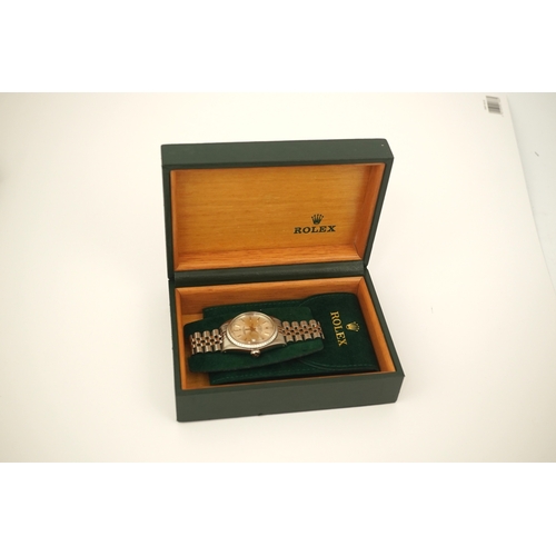 144 - A gentleman's early 1980's stainless steel Rolex Oyster Perpetual Datejust wrist watch, on a stainle... 