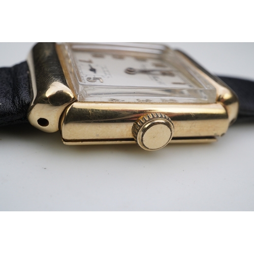 145 - A gentleman's mid 20th century 14k gold International Watch Company manual wind wrist watch, on a la... 