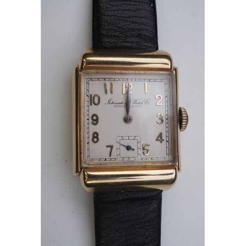 145 - A gentleman's mid 20th century 14k gold International Watch Company manual wind wrist watch, on a la... 