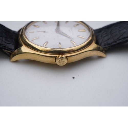 147 - A gentleman's fine 18ct gold Patek Philippe Calatrava automatic wrist watch, model number 2526, on a... 