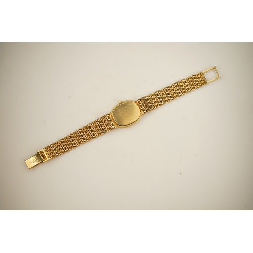 148 - A lady's 18ct gold Patek Philippe manual wind wrist watch, on an integral 18ct gold Patek Philippe b... 