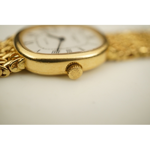 148 - A lady's 18ct gold Patek Philippe manual wind wrist watch, on an integral 18ct gold Patek Philippe b... 