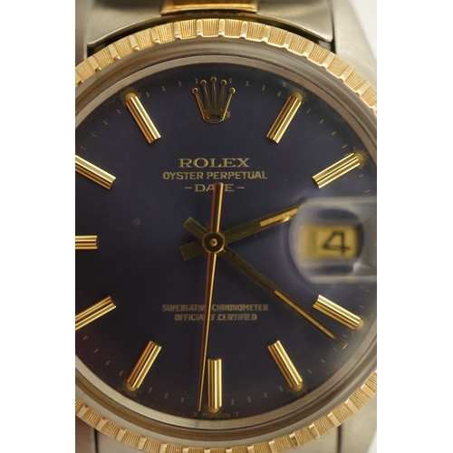 149 - A gentleman's early 1980's stainless steel and gold Rolex Oyster Perpetual Date wrist watch, on a st... 