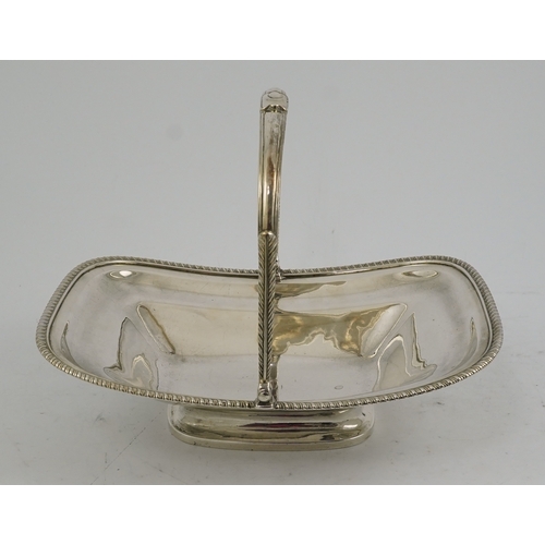 15 - A George III silver bread basket, of rounded rectangular boat form, with gadrooned border and contem... 