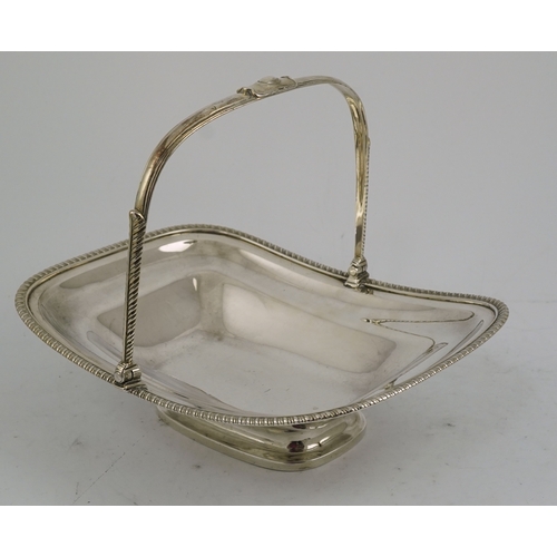 15 - A George III silver bread basket, of rounded rectangular boat form, with gadrooned border and contem... 