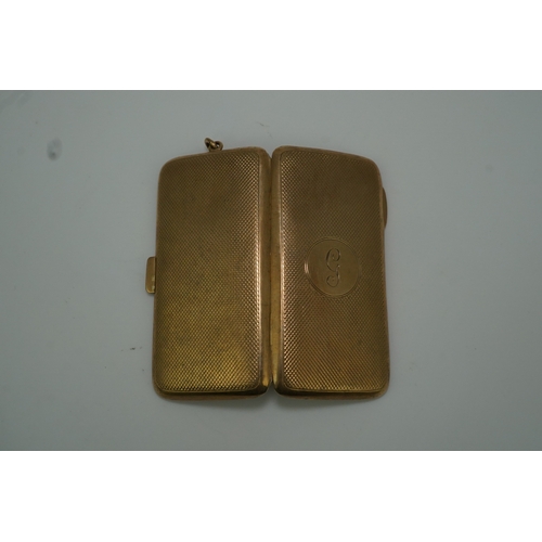 151 - A George V 9ct gold cigarette case, circa 1919, with engine turned decoration and engraved with the ... 