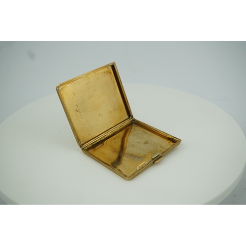 153 - A 9ct gold cigarette case, circa 1930 of square outline, the exterior with engine turned decoration ... 