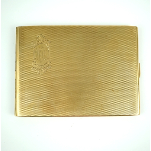 155 - A 9ct gold cigarette case, circa 1929, with engine turned decoration and engraved monogram, length 1... 