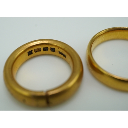 157 - Five 22ct gold wedding bands, each with British hallmarks, combined gross weight 33 grams