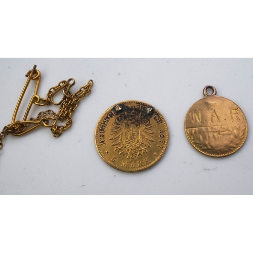 162 - Seven assorted mounted or drilled gold coins, comprising: an 1898 gold 1 pound coin; a 1902 sovereig... 