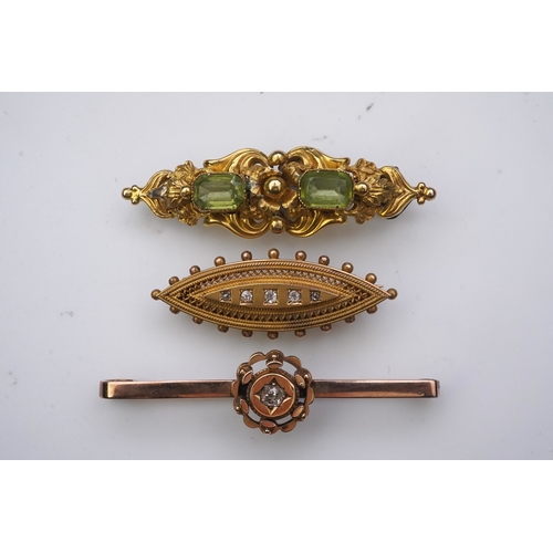 163 - A group of three gem-set brooches, 19th/early 20th century Comprising: a brooch of scrolled design, ... 