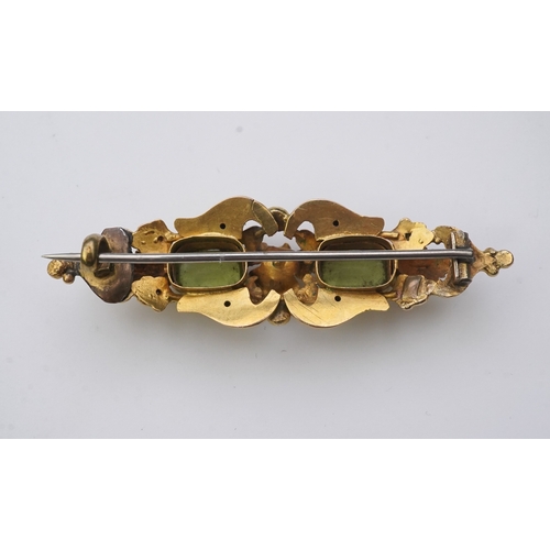 163 - A group of three gem-set brooches, 19th/early 20th century Comprising: a brooch of scrolled design, ... 