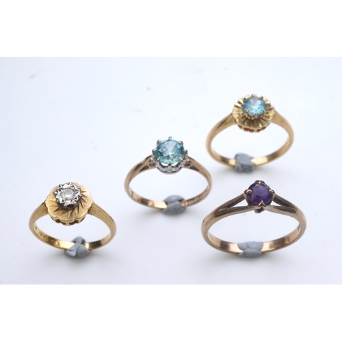 176 - Four rings comprising: a ring set with a circular-cut blue zircon in a faceted border, size M, stamp... 