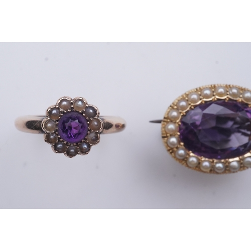 179 - An amethyst brooch and an amethyst mourning ring, early 20th century, comprising: an oval brooch set... 