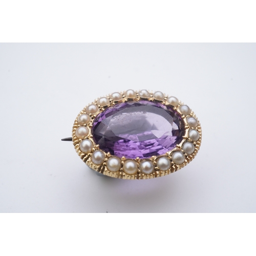 179 - An amethyst brooch and an amethyst mourning ring, early 20th century, comprising: an oval brooch set... 