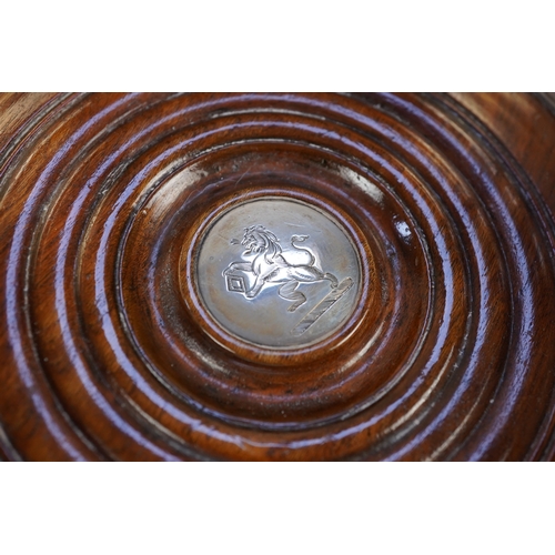 18 - A pair of late George III silver wine coasters, by William Bateman, with gadrooned borders and turne... 