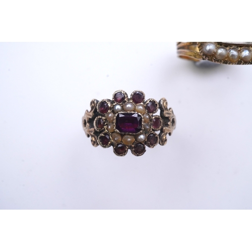 183 - A George III seed pearl mourning ring and a garnet and seed pearl ring, mid 19th century, the seed p... 