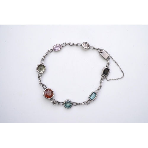 184 - A collection of silver and gem-set jewellery, comprising: a necklace, spectacle-set with variously c... 