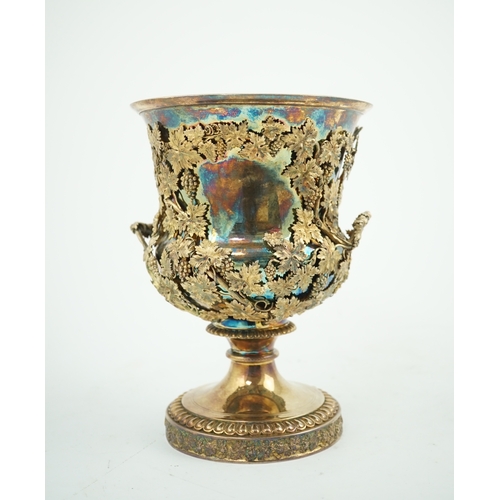 19 - A late George III silver gilt two handled campana vase, maker's mark rubbed, with applied continuous... 