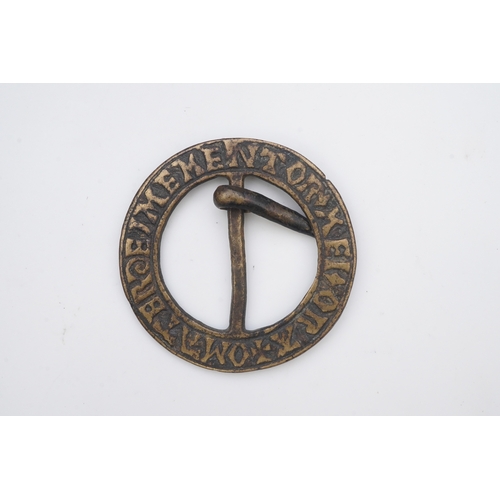 194 - A bronze buckle, 15th-17th century, of circular outline, bearing the inscription 'O MATER DEI MEMENT... 