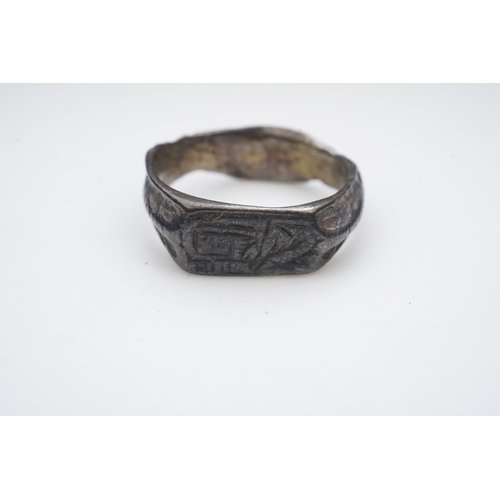 196 - A medieval iconographic ring, England, 14th/15th century the front engraved with a cowled bust of a ... 