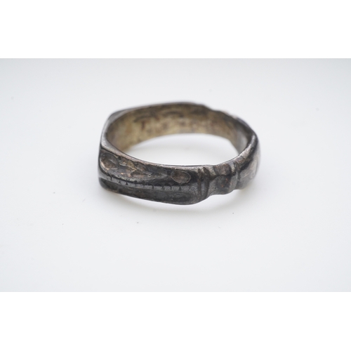 196 - A medieval iconographic ring, England, 14th/15th century the front engraved with a cowled bust of a ... 