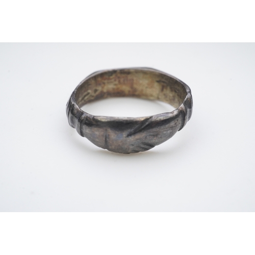 196 - A medieval iconographic ring, England, 14th/15th century the front engraved with a cowled bust of a ... 