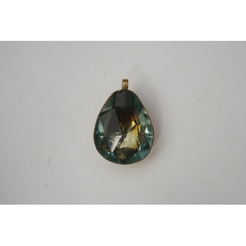 202 - A 'Queen Anne' paste pendant, 18th century, of pear-shaped outline, set with a rose-cut pale blue pa... 