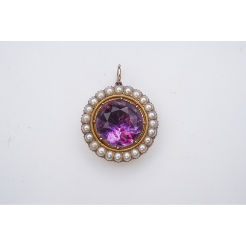 206 - A Victorian amethyst and half pearl pendant, mid 19th century, set with a circular-cut amethyst in a... 