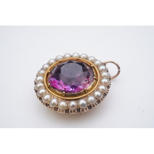 206 - A Victorian amethyst and half pearl pendant, mid 19th century, set with a circular-cut amethyst in a... 