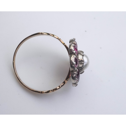 207 - A pearl and pink tourmaline ring, of cluster design, centring on a pearl within a border of circular... 