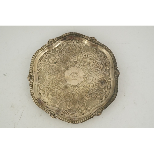 21 - A George III Scottish silver salver by George Fenwick, of shaped circular form, with gadrooned and s... 