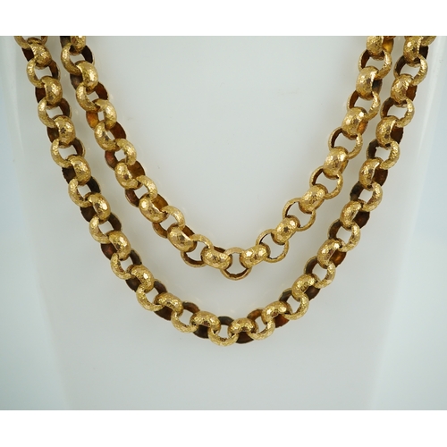 211 - An attractive Georgian gold long guard chain, early 19th century, composed of gold links stamped wit... 