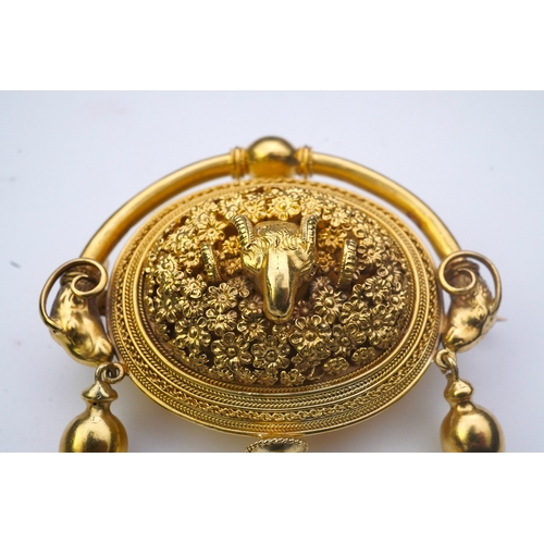 213 - An Archaeological Revival gold brooch, Papal States, 1860s, composed of an oval panel intricately mo... 