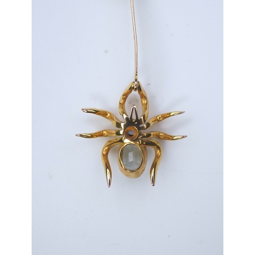 214 - An aquamarine and sapphire necklace, designed as a spider and fly, set with oval and circular-cut aq... 