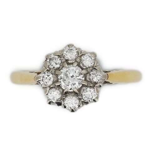 224 - Asprey & Co., a diamond ring, of cluster design, claw-set with brilliant-cut diamonds totalling appr... 