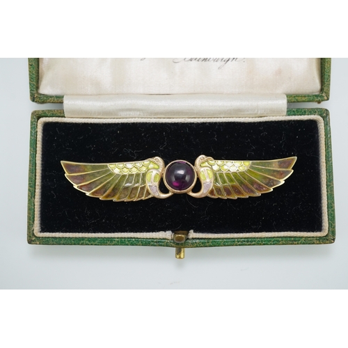 228 - An Egyptian Revival tourmaline and enamel brooch, circa 1900 centring on a cabochon pink tourmaline,... 