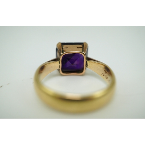 229 - A late Victorian amethyst ring, circa 1893 claw-set with a step-cut amethyst, inscribed '25 April 18... 