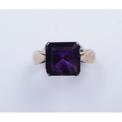 229 - A late Victorian amethyst ring, circa 1893 claw-set with a step-cut amethyst, inscribed '25 April 18... 