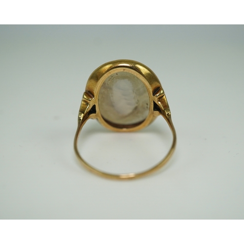 231 - A chalcedony intaglio ring, early 19th century, set with a pale chalcedony intaglio depicting a lady... 