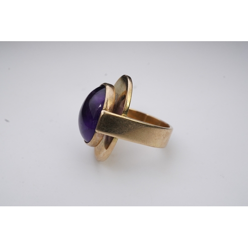 237 - Reeslev, an amethyst ring, Denmark, collet-set with a cabochon amethyst, within a polished oval bord... 