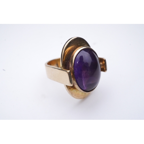 237 - Reeslev, an amethyst ring, Denmark, collet-set with a cabochon amethyst, within a polished oval bord... 