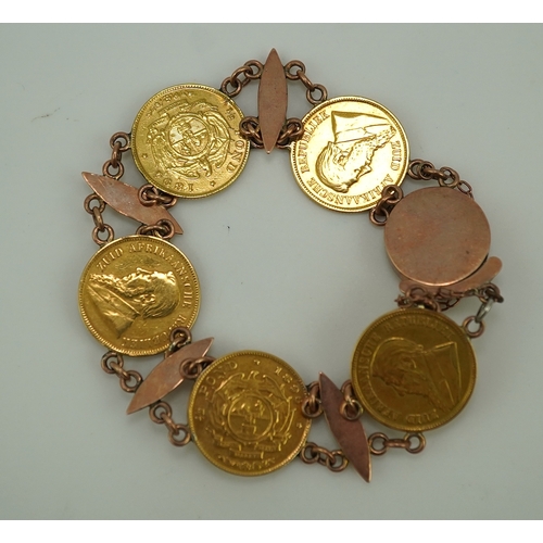 242 - A late 19th century gold coin bracelet, with torpedo links and set with five South African gold half... 