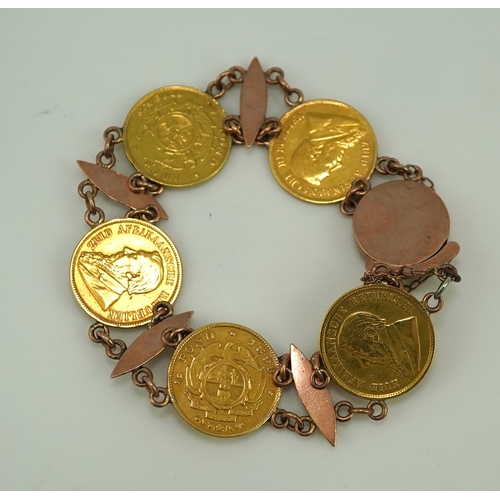 242 - A late 19th century gold coin bracelet, with torpedo links and set with five South African gold half... 