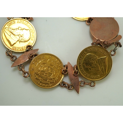 242 - A late 19th century gold coin bracelet, with torpedo links and set with five South African gold half... 