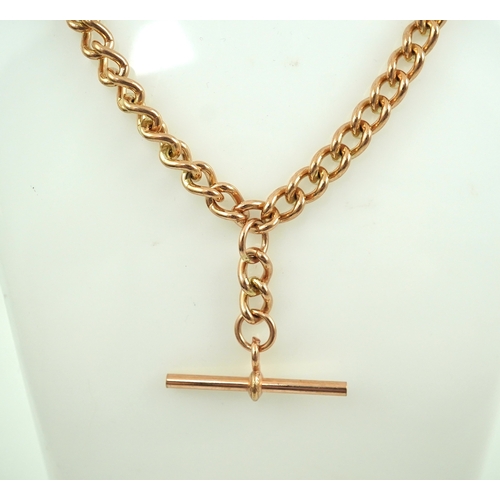 249 - A 9ct gold Albert chain, of curb linking, suspending a T-bar pendant, length 49cm, links stamped 375... 